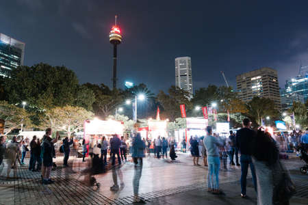 Sydney, Australia - December 22, 2019: Crowd of people around Sydney CBD at night.のeditorial素材