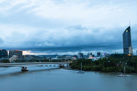 Brisbane, Australia - January 25, 2020: Cloudy view over the Brisbane river and city skyline.のeditorial素材
