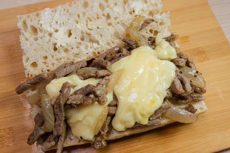Close-up view of the Philly Cheesesteak sandwich.