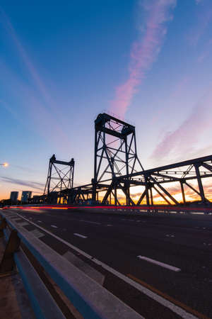 Car traffic at Ryde Bridge, Sydney, during sunset time.の写真素材