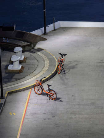 Sydney, Australia - June 7, 2020: Two bicycle parked on the street side.のeditorial素材