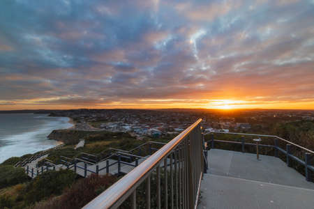 Cloudy sunset view at Anzac Memorial Walk, Newcastle, Australia.
