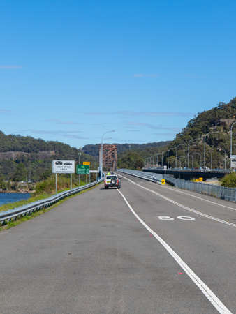 Sydney, Australia - August 16, 2020: Peats Ferry bridge at Central Coast during the day.のeditorial素材