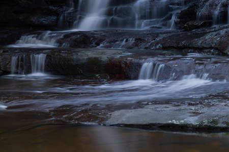 Water flowing through rock formation.
