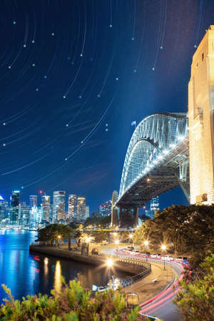 Star trails above Sydney Harbour Bridge, Australia.