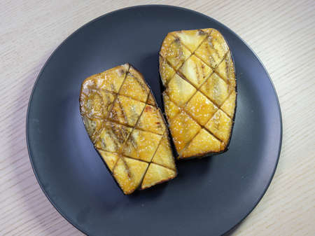 A plate of miso glazed eggplant (nasu dengaku).の写真素材