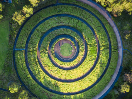 Top down view of green spiral hilltop.の写真素材