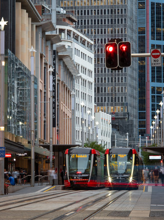 Sydney, Australia - February 4, 2021: Two trams at the stop at Sydney CBD.のeditorial素材