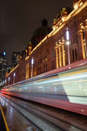 Sydney, Australia - March 18, 2021: Tram passing through Queen Victoria Building at night.のeditorial素材