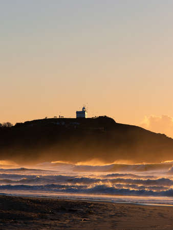 Golden light on Tacking Point Lighthouse, Port Macquarie, Australia.の写真素材