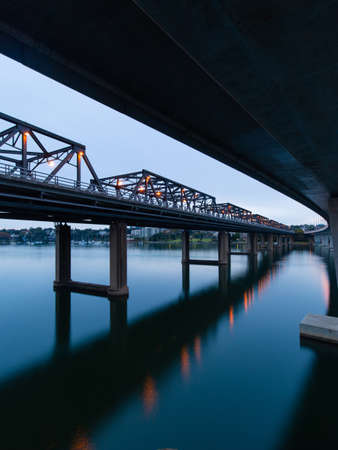 Curve bridge and Iron Cove Bridge at dawn, Sydney, Australia.の写真素材