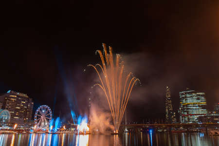 Sydney, Australia - June 11, 2021: Yellow fireworks at Darling Harbour for Sydney Solstice.のeditorial素材
