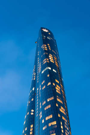 Sydney, Australia - June 13, 2021: Looking up view of Crown Towers Hotel at dusk.のeditorial素材