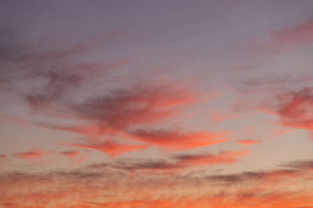 Beautiful red clouds on sunrise sky.