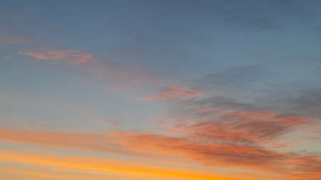 A beautiful sunrise with blue and orange tone.の写真素材