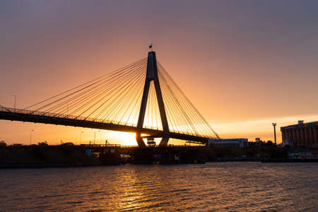 Sydney, Australia - November 18, 2021: Sunset view of Anzac Bridge from Waterfront Park.のeditorial素材