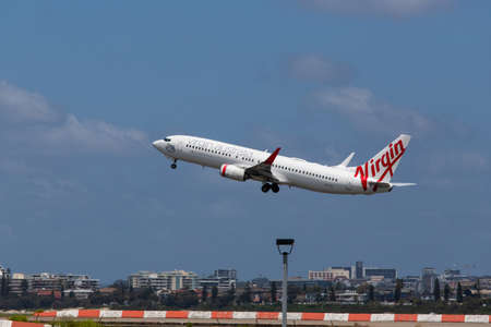 Sydney, Australia - December 20, 2021: Virgin Australia Boeing 737 taking off at Sydney Airport. Registration VH-YIO.のeditorial素材