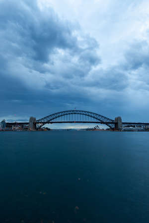 Sydney, Australia - December 19, 2021: Cloudy dawn view of Sydney Harbour.のeditorial素材