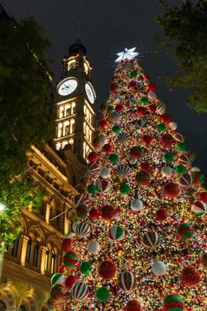 Sydney, Australia - December 22, 2021: Christmas Tree and clock tower at Martin Place.のeditorial素材