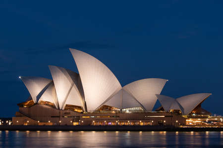 Sydney, Australia - December 24, 2021: Night view of Sydney Opera House with blue sky.のeditorial素材