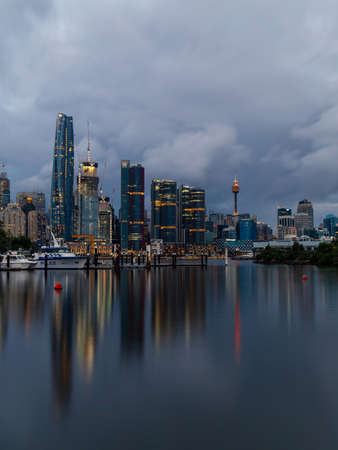 Sydney, Australia - March 26, 2022: Cloudy dusk view of Sydney CBD skyline.のeditorial素材