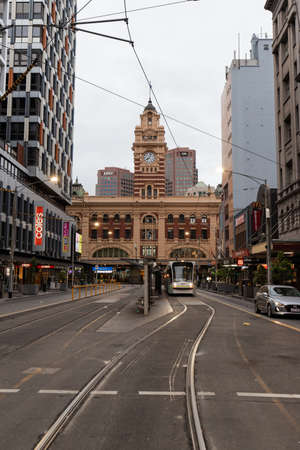 Melbourne, Australia - April 2, 2022: View of tram and Flinders Station in the morning.のeditorial素材