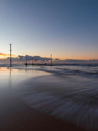 Dawn view of Mona Vale rock pool, Sydney, Australia.の写真素材