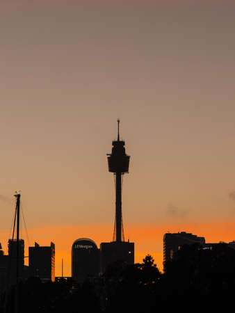 Sydney, Australia - April 18, 2022: Silhouette of Sydney Tower with sunrise sky.