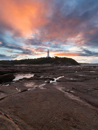 Colorful sunset sky at Norah Head Lighthouse, Central Coast, Australia.の写真素材