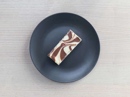 A plate of chocolate cheesecake.
