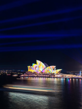 Sydney, Australia - May 27, 2022: Boat trails and Sydney Opera House lights up at Vivid Sydney.のeditorial素材