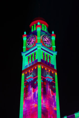 Sydney, Australia - May 27, 2022: Central station clock tower illuminated as part of Vivid Sydney.のeditorial素材