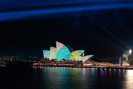 Sydney, Australia - May 27, 2022: Sydney Opera House light up and light beams for Vivid Sydney.のeditorial素材