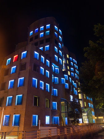 Sydney, Australia - May 27, 2022: Blue illumination of UTS building window.のeditorial素材