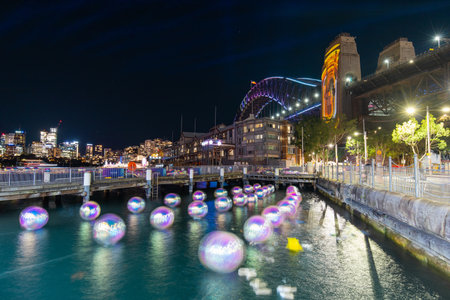 Sydney, Australia - May 31, 2022: Pier One and Sydney Harbour Bridge during Vivid Sydney.のeditorial素材