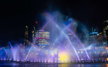 Sydney, Australia - June 8, 2022: Beautiful fountain show at Darling Harbour for Vivid Sydney.のeditorial素材
