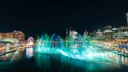 Sydney, Australia - June 8, 2022: Colorful fountain show at Darling Harbour for Vivid Sydney.のeditorial素材