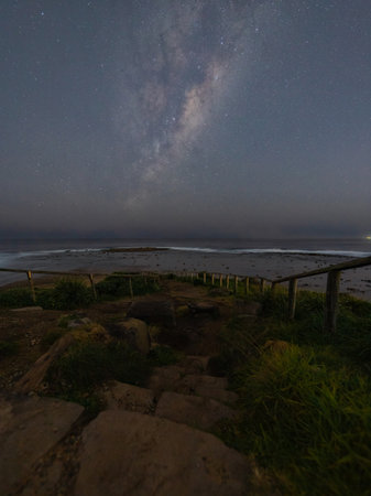 Coastline with milky way galaxy at night.の写真素材