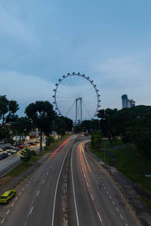 Singapore - May 23, 2022: Cloudy sunset view of Singapore Flyer.のeditorial素材