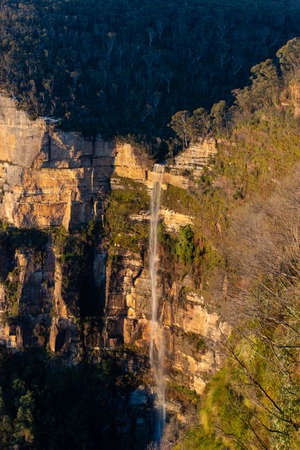 Tall waterfall in the mountain.の写真素材