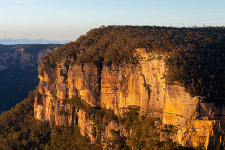Warm sunlight on the rock cliff.の写真素材