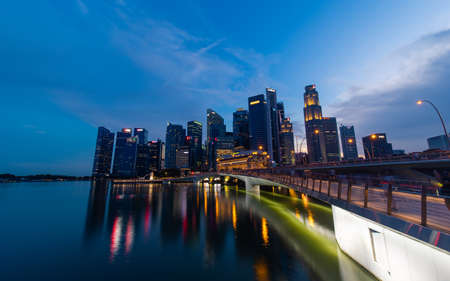 Singapore - May 22, 2022: Dusk view of Singapore downtown skyline.のeditorial素材