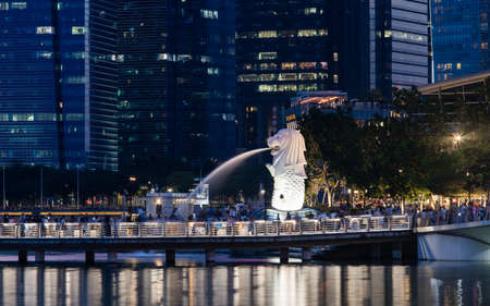 Singapore - May 22, 2022: Merlion statue with water fountain at night.のeditorial素材