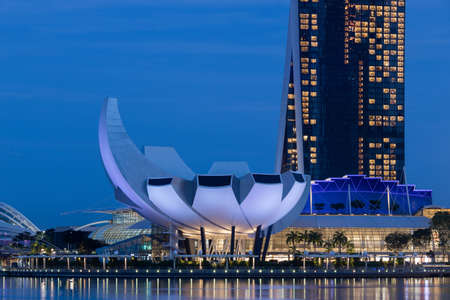 Singapore - May 22, 2022: ArtScience Museum waterfront view at night.のeditorial素材