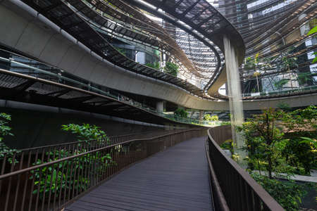 Singapore - May 22, 2022: Curve walkway at Marina One.のeditorial素材