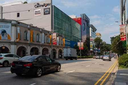 Singapore - May 23, 2022: Car driving through Orchard Rd during the day.のeditorial素材