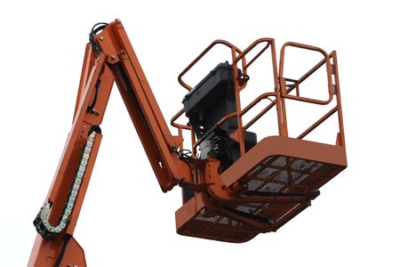 An Orange Mechanical Lift - Cherry Picker.の写真素材