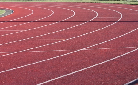 The Curves of an Athletics Track with a Red Surface の写真素材