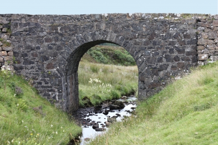An Old Stone Built Bridge Over a Small Stream.の写真素材