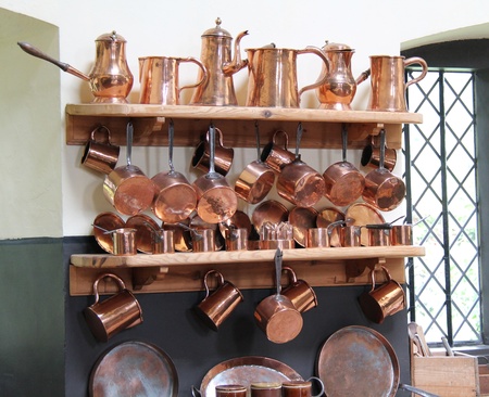 A Display of Traditional Kitchen Copper Saucepans の写真素材
